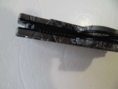 U S A Columbia flip knife size is 210mm with blade open