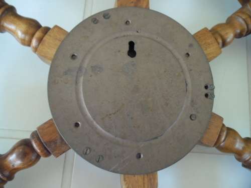 Center brass Porthole with clock working and wood ships wheel add to your order postnet postage R220