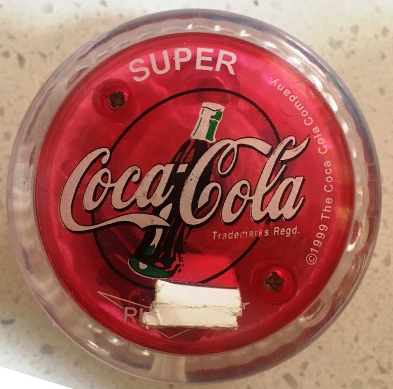 YoYo SUPER RUSSELL Coca Cola, with internal LEDs that light up Trademarks regd.1999