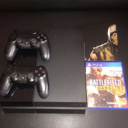 playstation 4 for sale with 2 remotes and 2 games