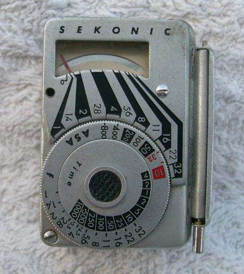 Vintage Sekonic light meter with leather case