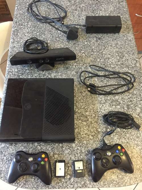 X Box 360 Plus Kinect and 4 Games