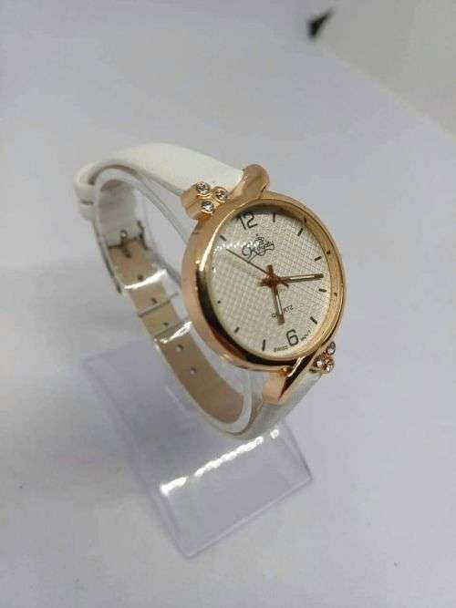 Royalty rose gold with white strap