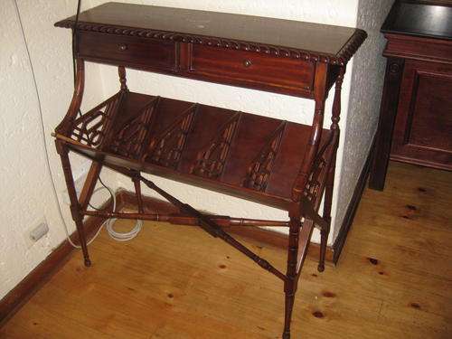 Telephone table with shelves for books