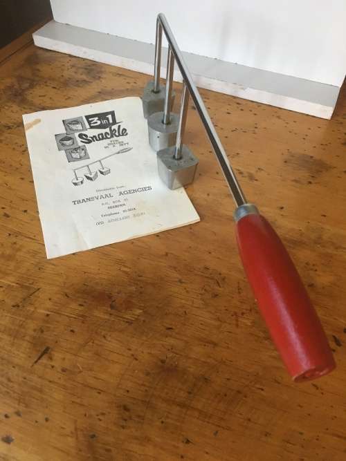 Vintage Snackle with red wooden handle