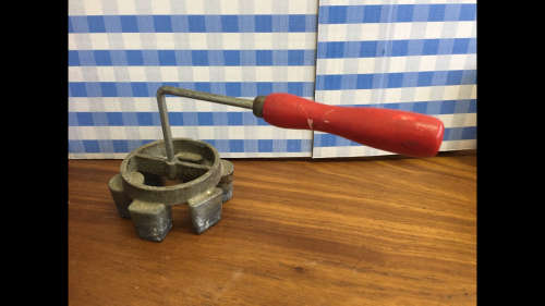 Vintage Snackle with red wooden handle