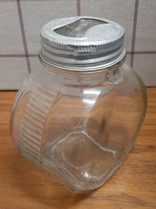 Vintage Glass Bottle / Jar with interesting lid - See pictures