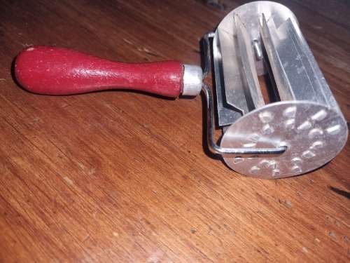 Vintage Koeksister cutter with wooden handle