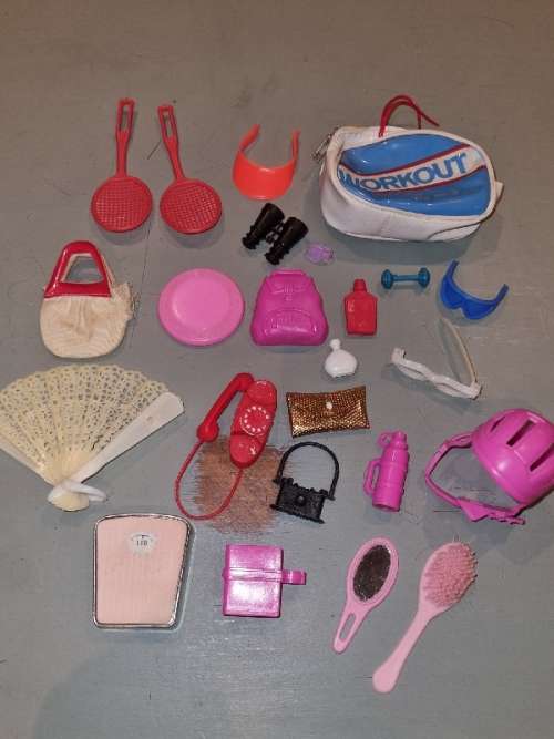 Barbie accessories including Bags, telephone, watch, helmet, camera, scale, etc.
