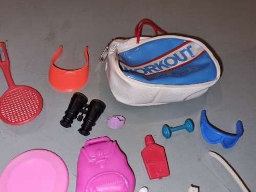 Barbie accessories including Bags, telephone, watch, helmet, camera, scale, etc.
