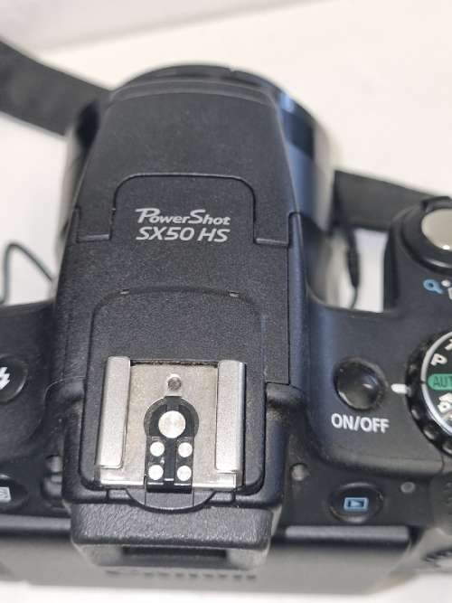 Canon Power Shot SX50 HS with extra battery and bag