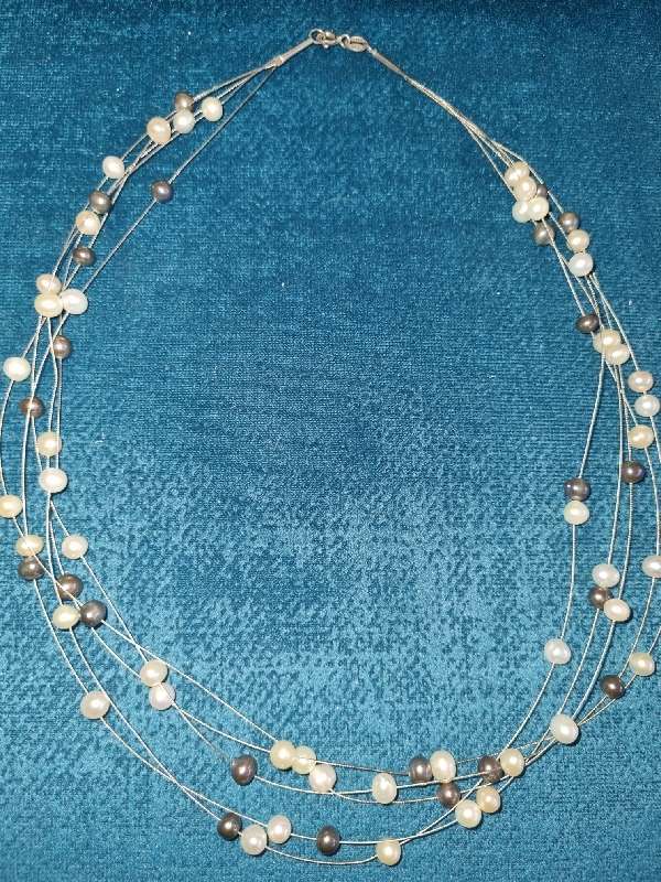 Floating Pearl necklace with sterling silver clasp