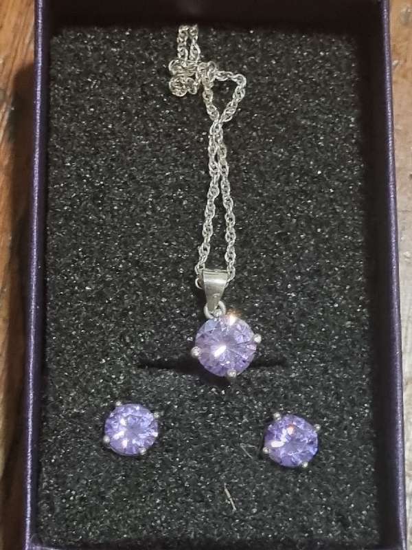 Sterling silver Necklace and earring set with purple stones