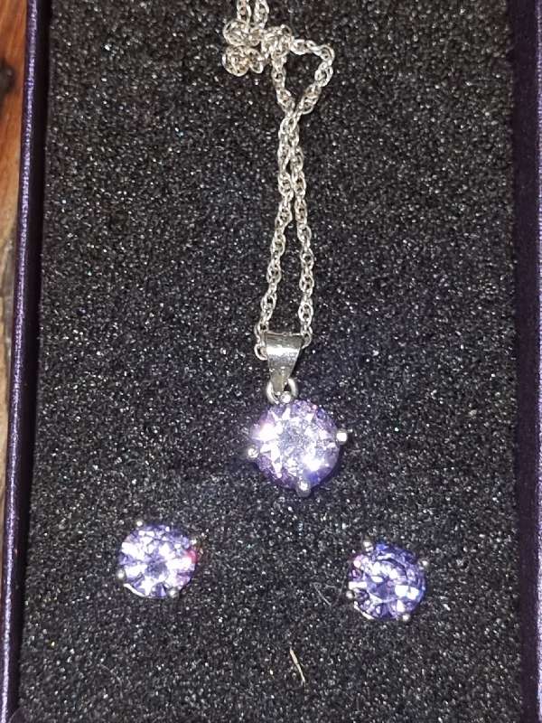 Sterling silver Necklace and earring set with purple stones