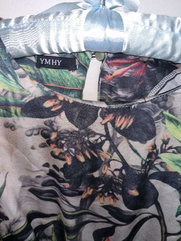 Jumpsuit with pockets and belt from Heartstuff - Size M
