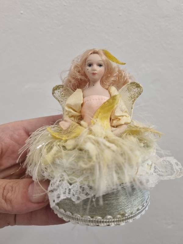 Small container with Porcelain doll top