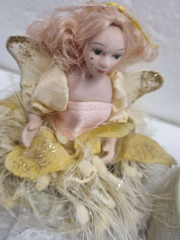 Small container with Porcelain doll top