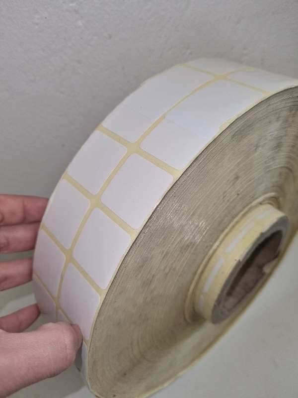 Very Large roll of white stickers - sticker size 3cm x 3cm each.  Very Large heavy roll!!