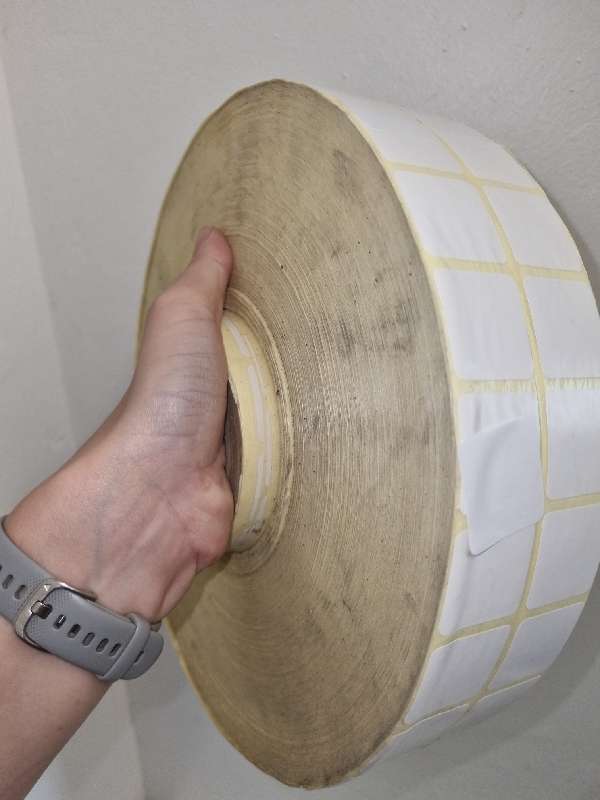 Very Large roll of white stickers - sticker size 3cm x 3cm each.  Very Large heavy roll!!