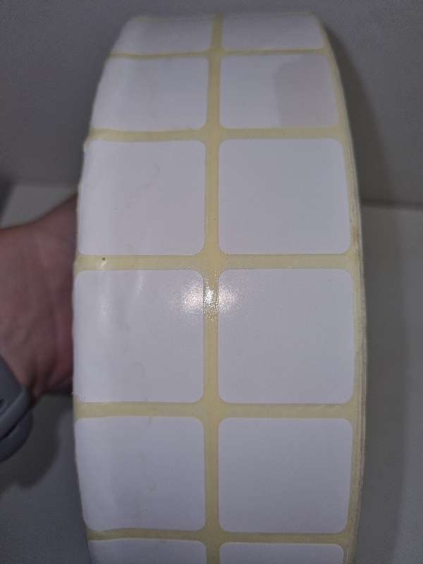 Very Large roll of white stickers - sticker size 3cm x 3cm each.  Very Large heavy roll!!