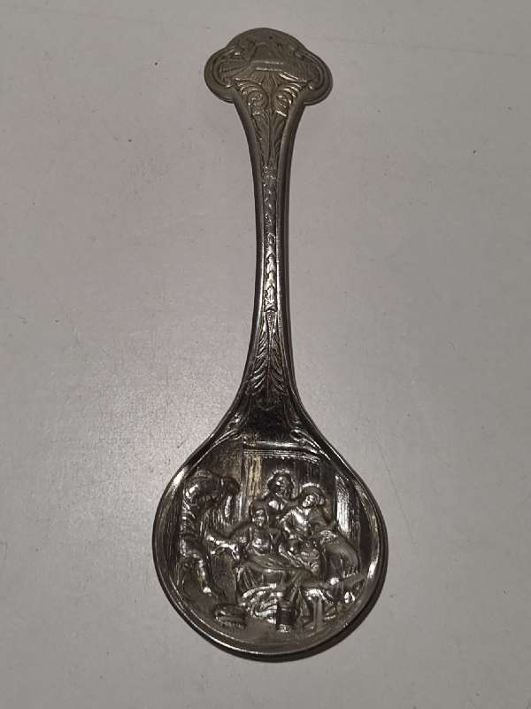 Ornate sugar spoon
