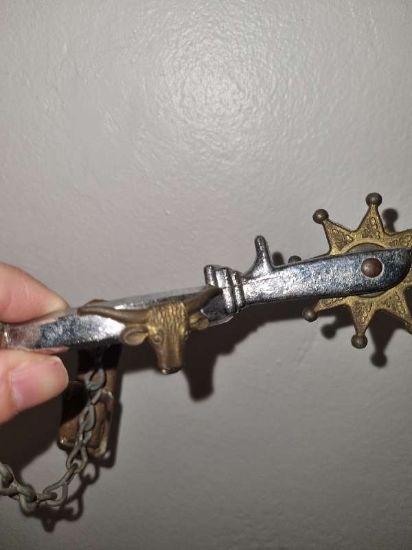 Antique Horse Riding Spur with bull detail