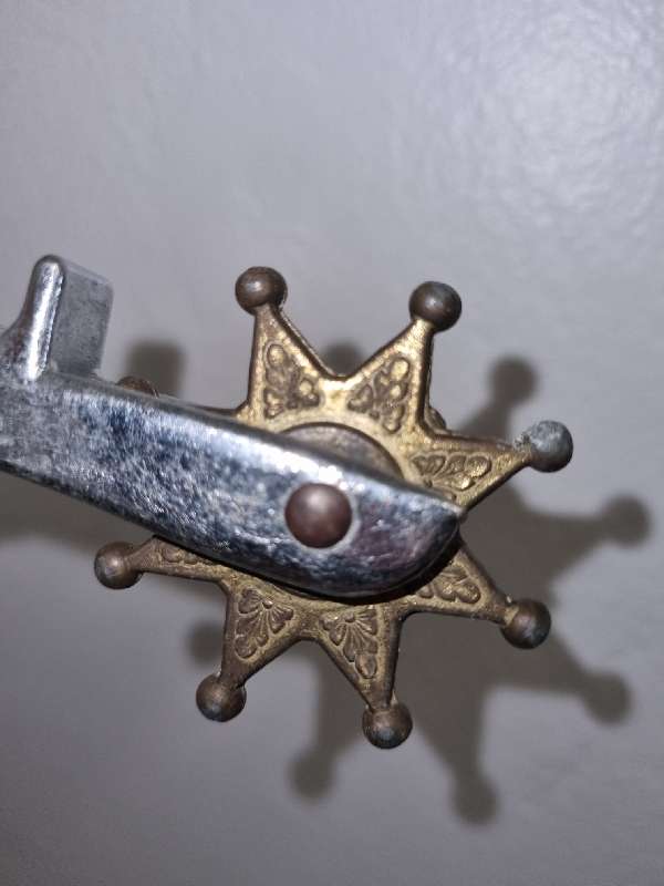 Antique Horse Riding Spur with bull detail