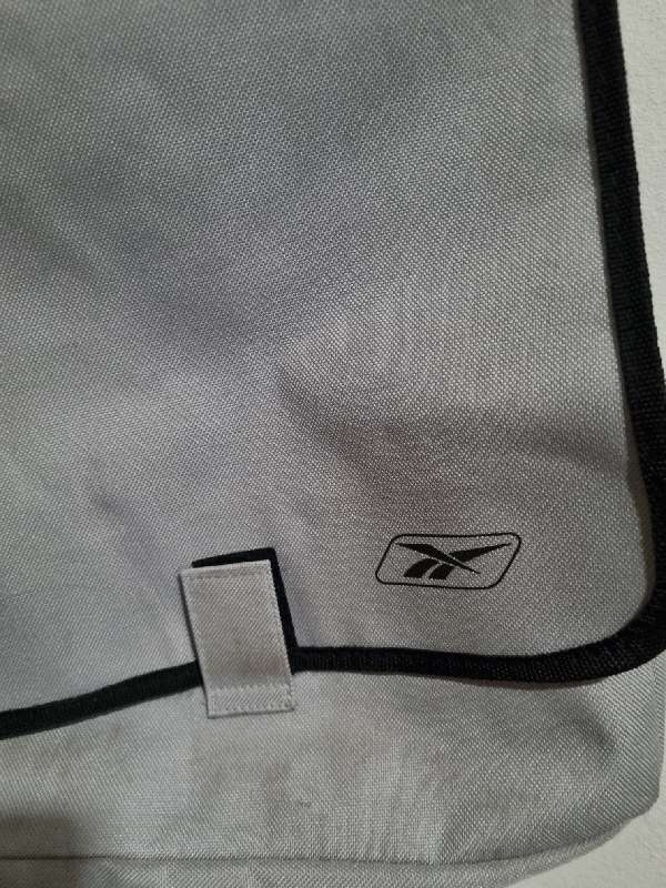 Reebok shoulder cross over bag with lots of storage space