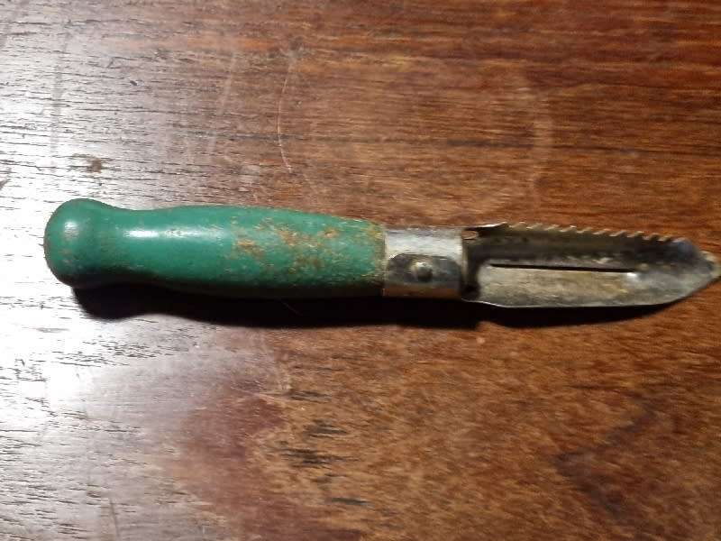 Vintage Kitchen tool with wooden handle