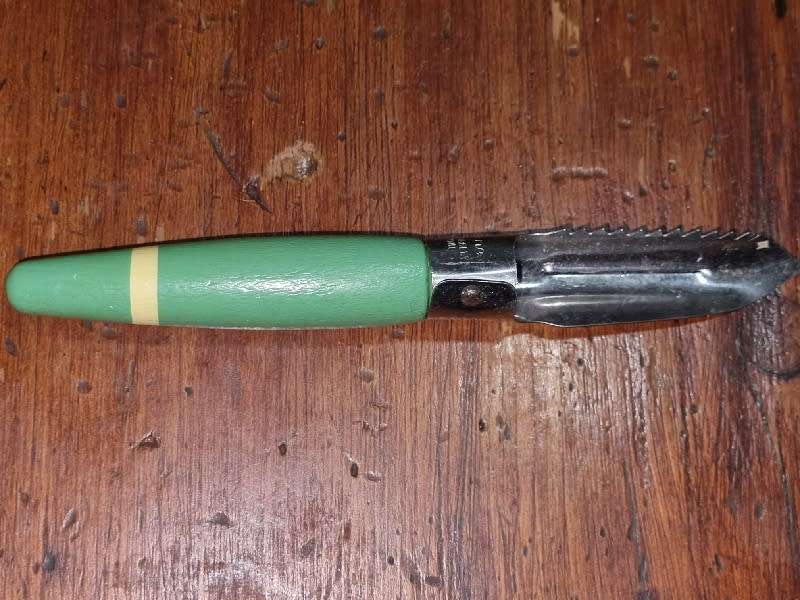 Vintage Skyline Kitchen Tool with wooden handle