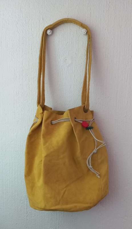 An amazing MOMO leather mustard yellow handbag