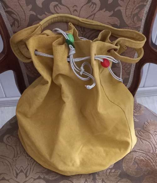 An amazing MOMO leather mustard yellow handbag
