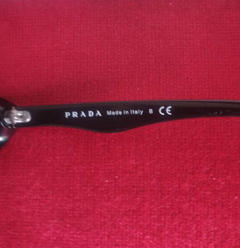 Gorgeous authentic cat eye Prada sunglasses for sale.