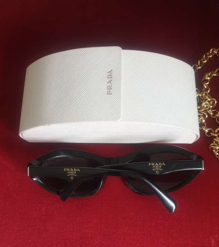 Gorgeous authentic cat eye Prada sunglasses for sale.