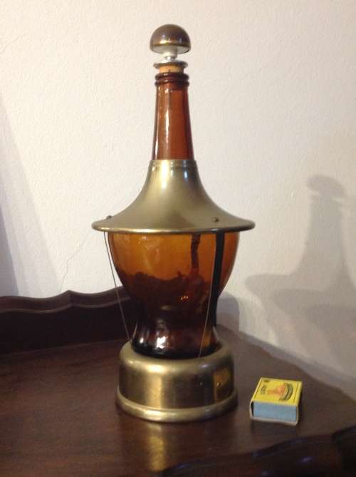 Amber and brass musical decanter pigeon