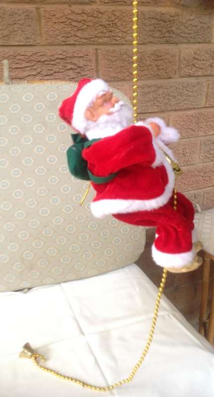 Musical Climbing Santa