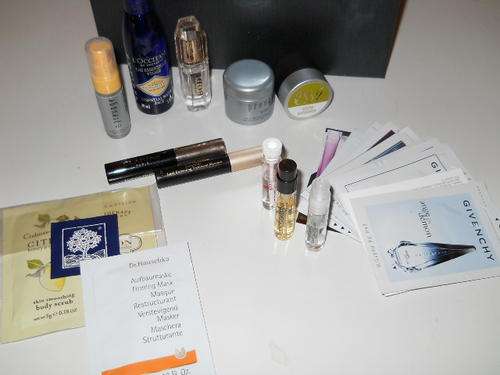 Box filled with luxury brand travel sized products!!