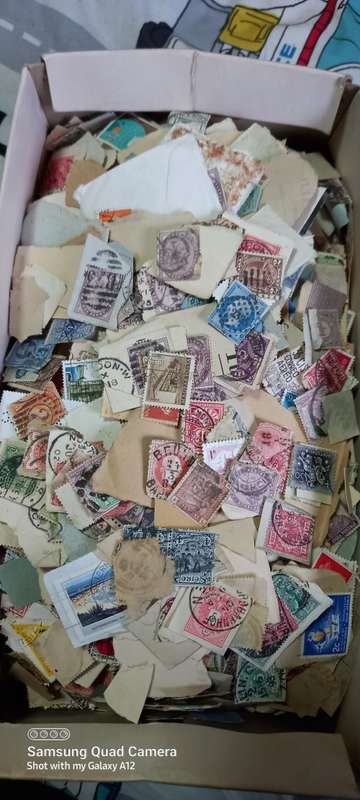 Stamps late 1800s to early 1900s British, German, French etc shoebox full.