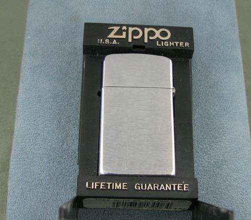 Original Zippo Lighter. Slim size. Original Box. USA.