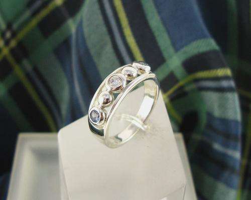 Very Unusual Vintage Eternity 925 Sterling Silver Ring with Blue & White Crystals.