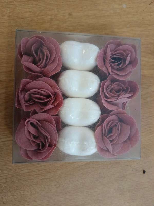 2 x candle holders,box off floating candles and holder for bottles