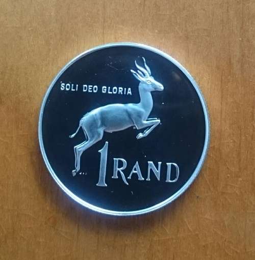 South Africa silver proof one rand in case. SOLI DEO GLORIA 1990.