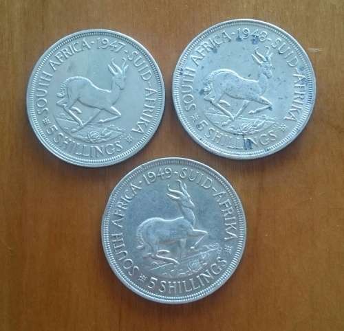 South Africa 80% silver 1947, 1948 and 1949 5 shillings in good condition.