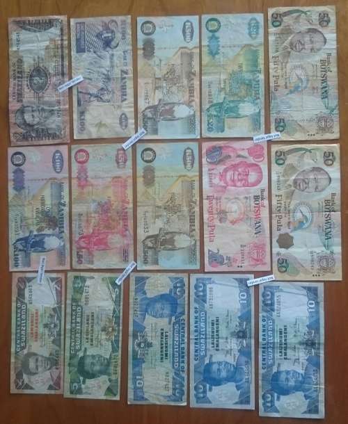 Collection of 15 bank notes from around the world.