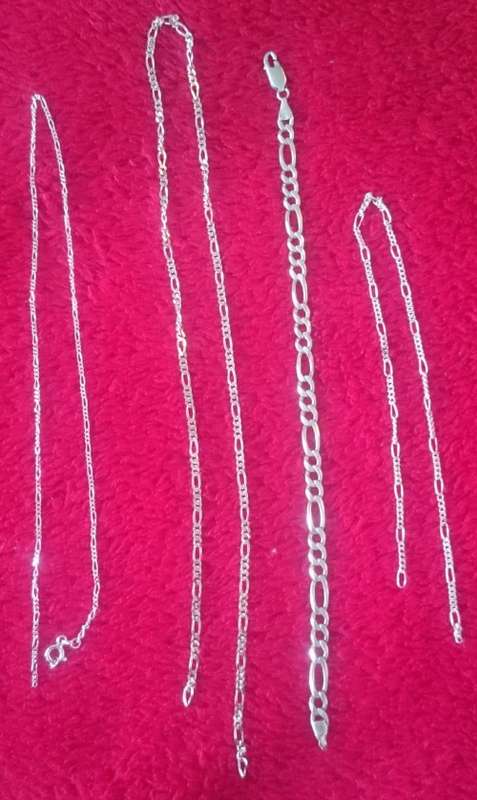 Collection of 4 x sterling silver necklaces. Broken. 23.14 grams of sterling silver.