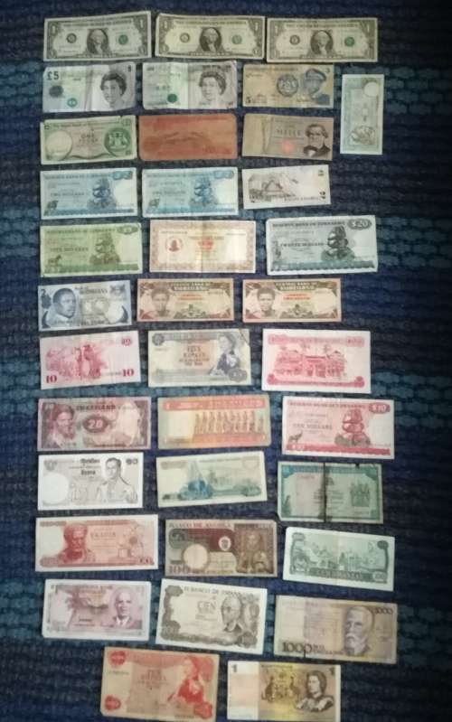 Collection of 36 old world bank notes.  Some dollars and some uk pounds.