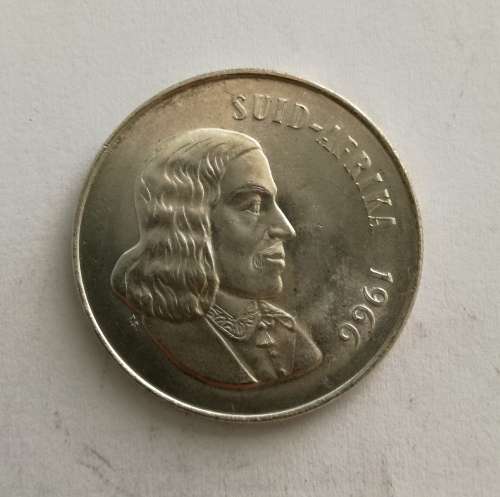 1966 Afrikaans silver south Africa one rand. Good condition.