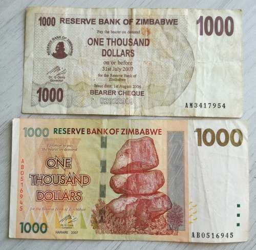 COLLECTION OF 2 ZIMBABWE ONE THOUSAND DOLLARS.  ONE BID TAKES ALL.