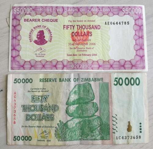 COLLECTION OF 2 ZIMBABWE FIFTY THOUSAND DOLLARS.  ONE BID TAKES ALL.