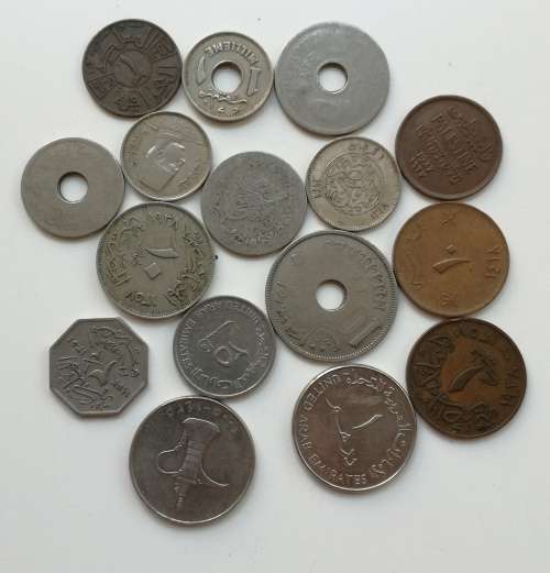 Collection of 16 Middle Eastern coins. Some Silver.